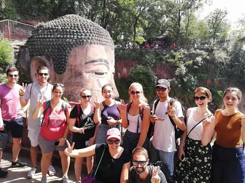 Guests below the Buddha's head