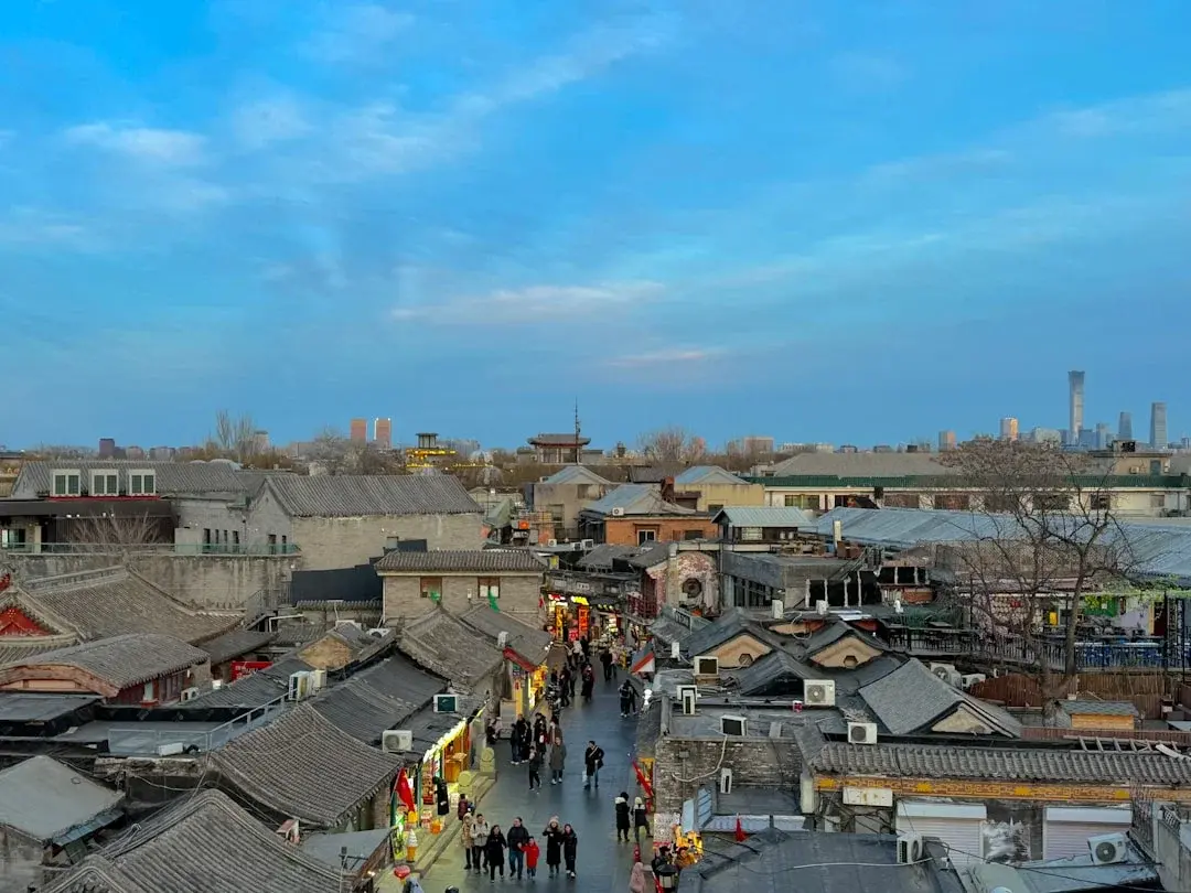 A narrow grey-brick hutong alley in old Beijing