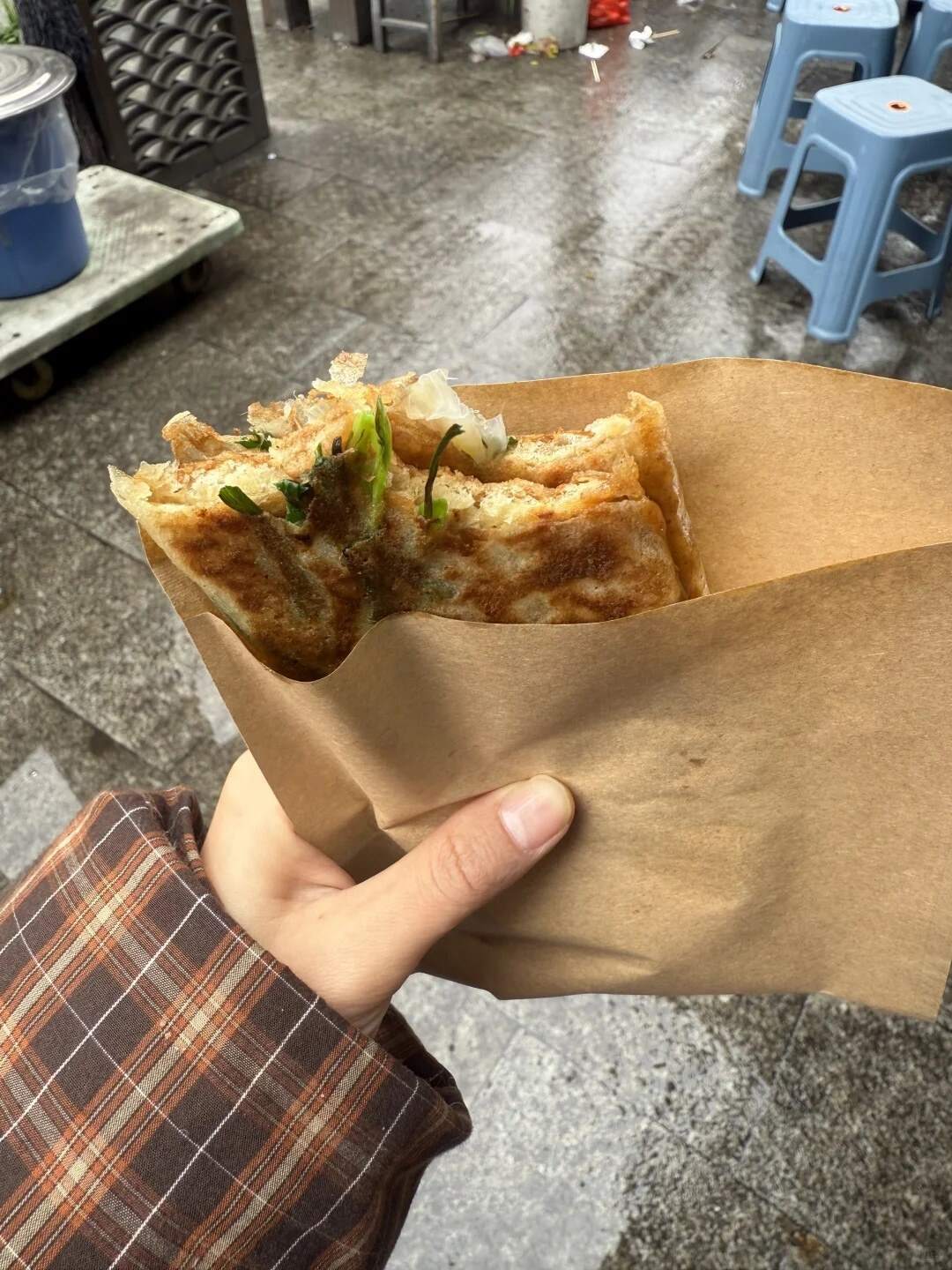 Freshly made congbaogui in a paper bag
