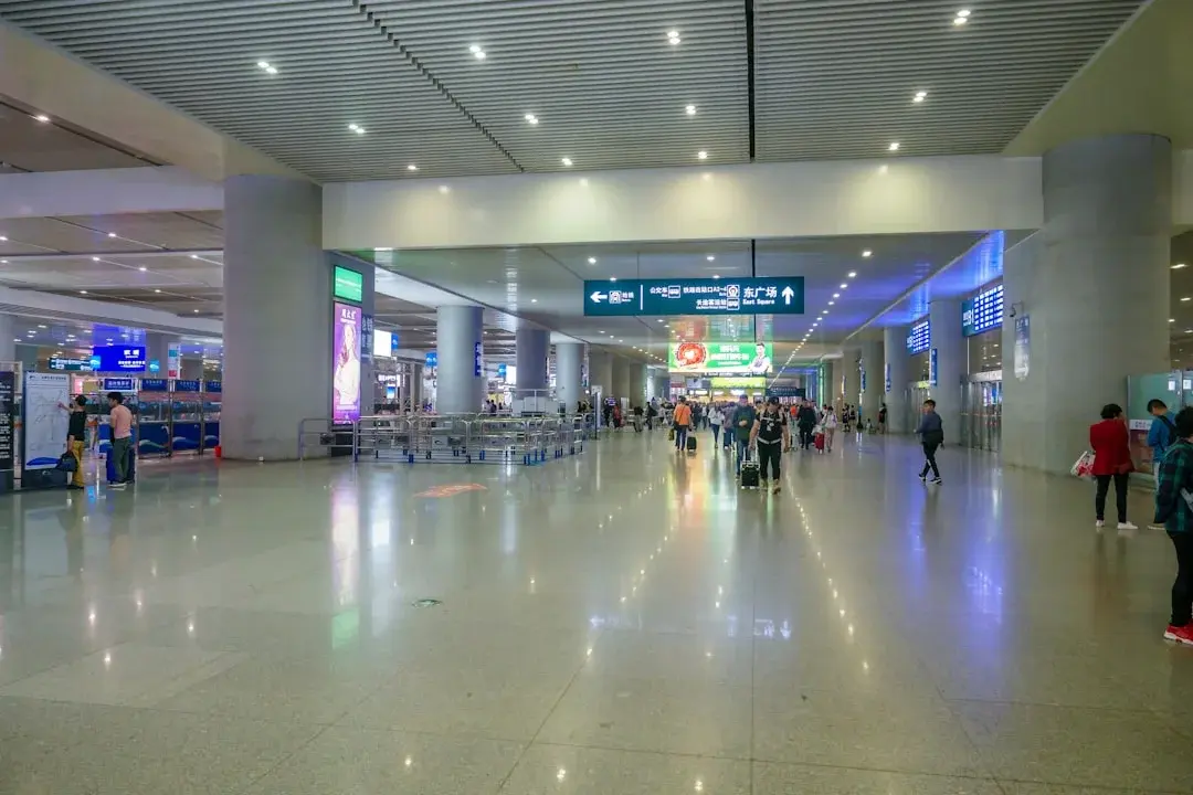A family with a toddler in a modern Chinese airport
