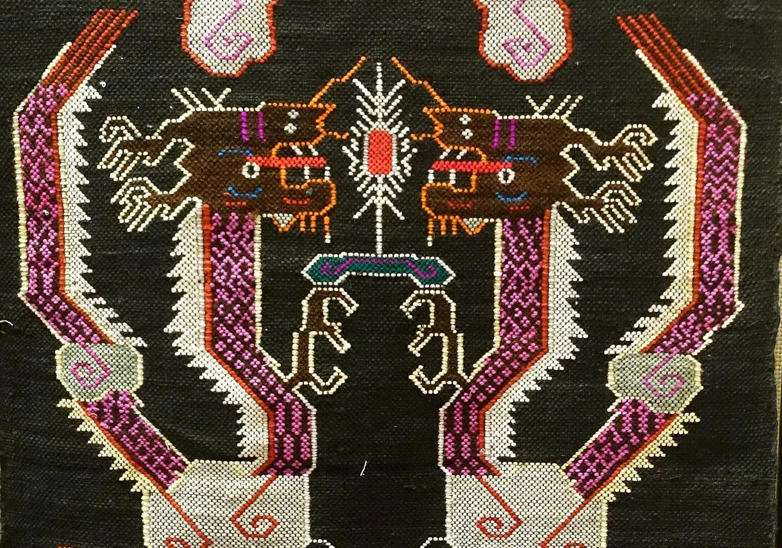 The dragon pair at close range, cut off the loom