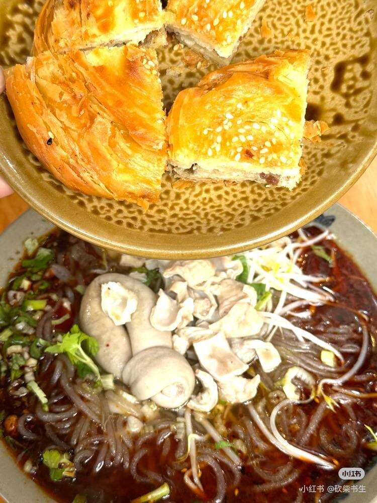 Crisp guokui over a bowl of fei chang fen