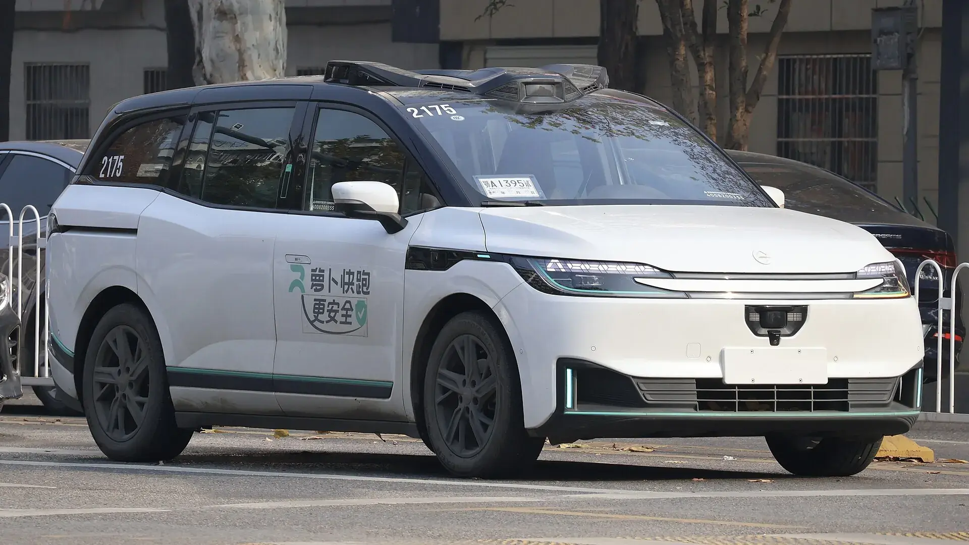 An Apollo Go robotaxi waiting at the kerb