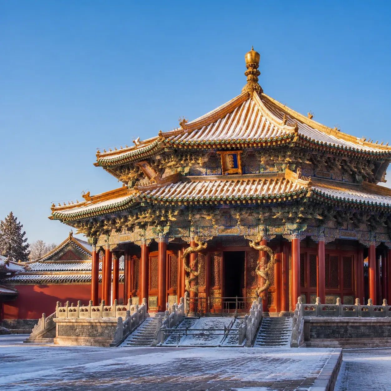 The golden-roofed halls of Mukden Palace, the Shenyang Imperial Palace, under a clear winter sky