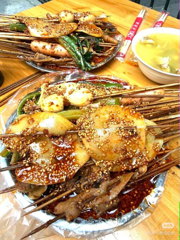 A table of bo bo ji skewers and sides