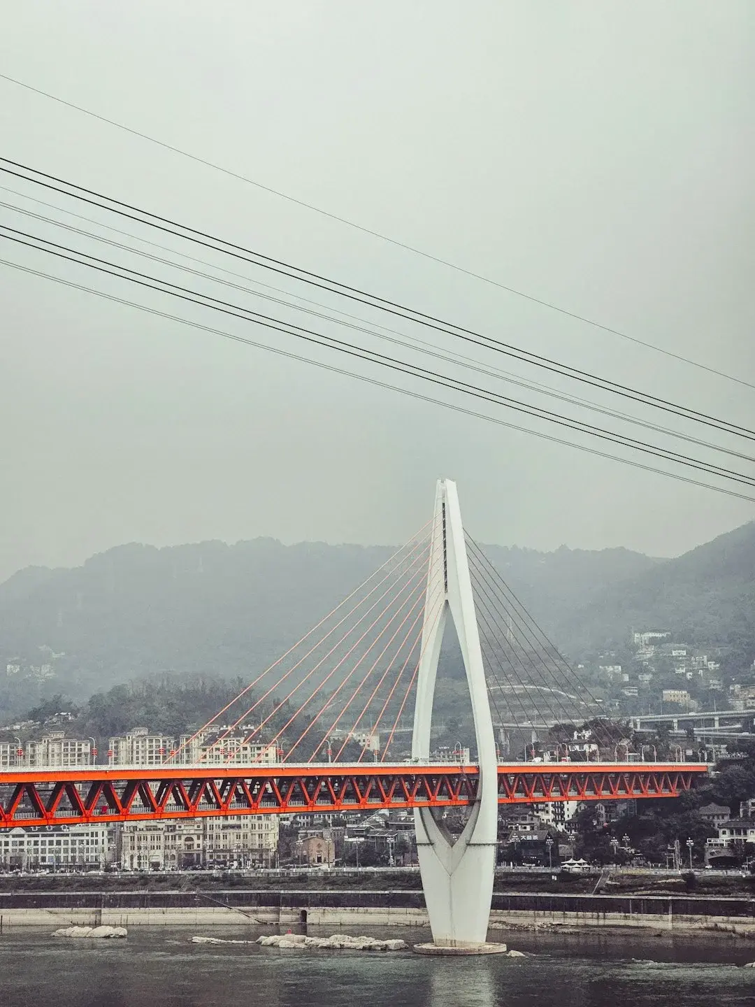 Chongqing's vertical mountain-city skyline of skyscrapers rising above the Yangtze river