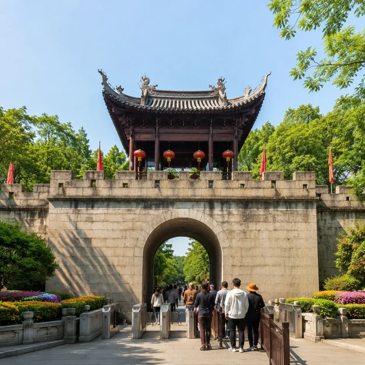Tourniquets à l'entrée d'un site pittoresque chinois — l'exemption ne couvre que le premier portail d'entrée