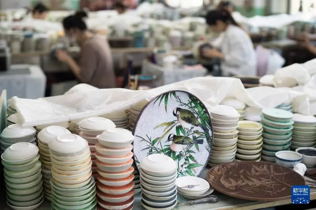 Stacked cloisonné blanks in a workshop