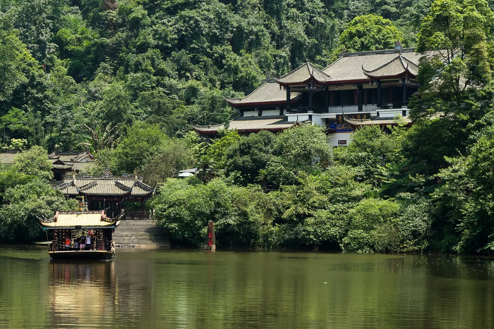 A pavilion above still water among the trees on Qingcheng