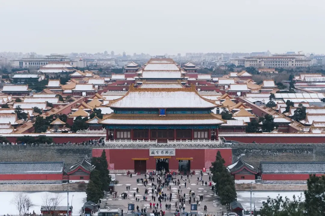 Golden rooftops of the Forbidden City in Beijing under a clear sky