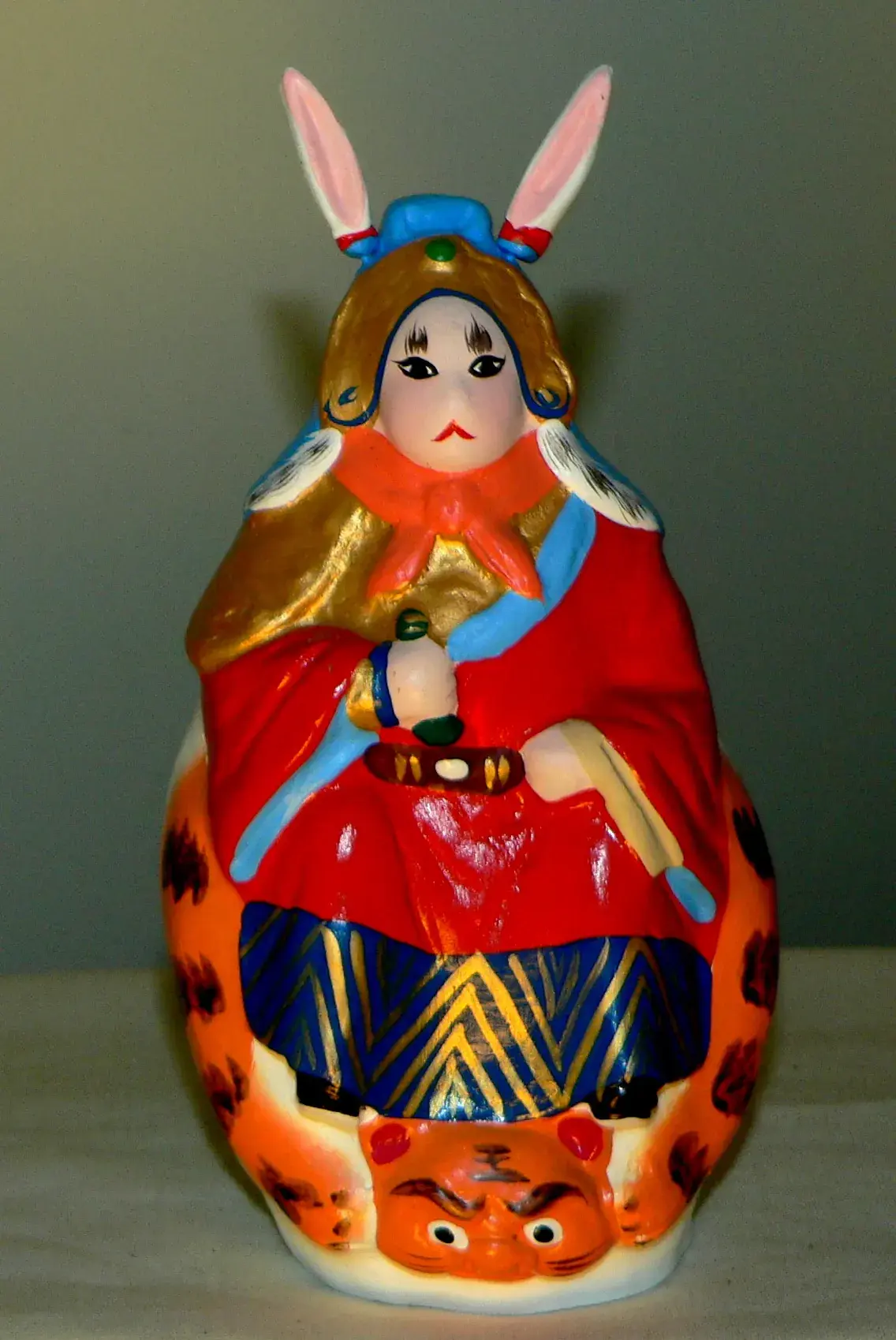 A single Tu'er Ye — armour, tiger mount, three-lobed mouth