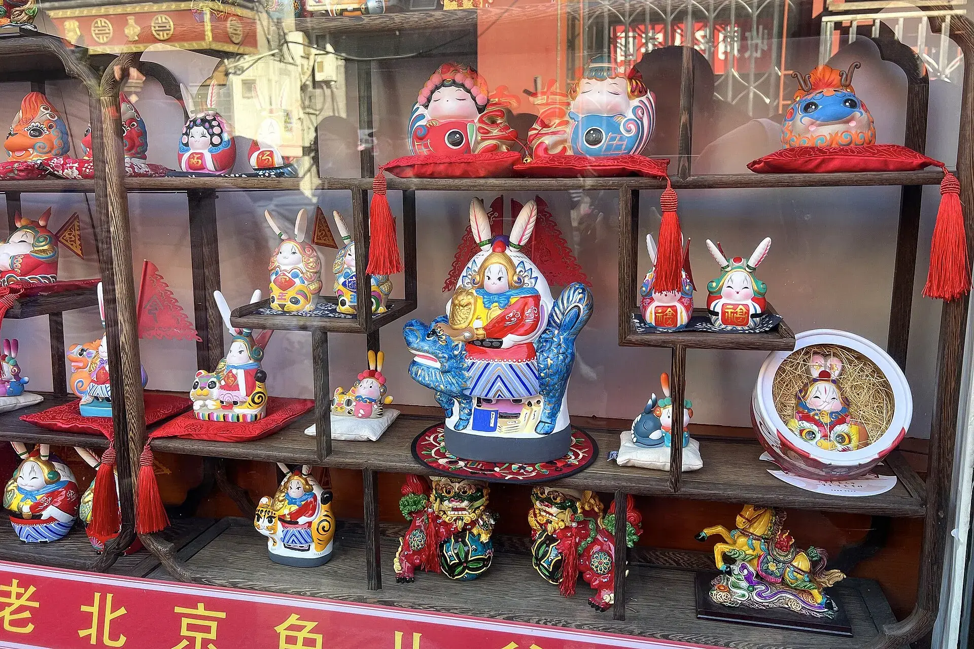 Shelves of Tu'er Ye figures at a Liulichang shop in Beijing