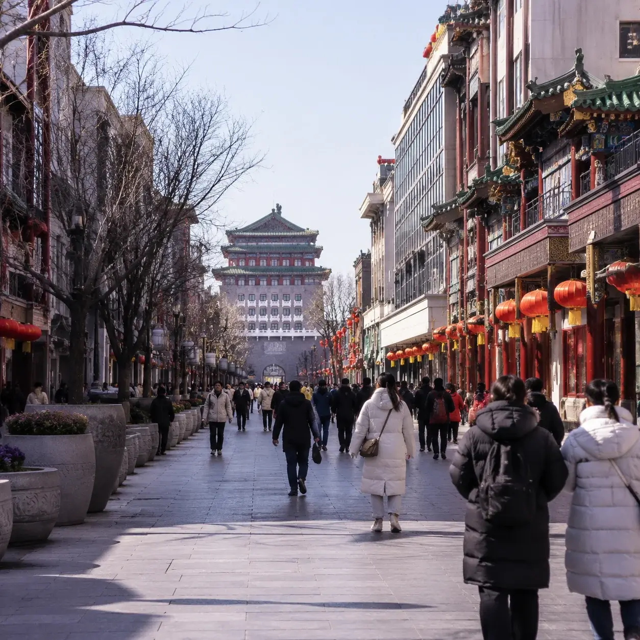 The broad car-free Wangfujing street lined with historic and modern shopfronts by day
