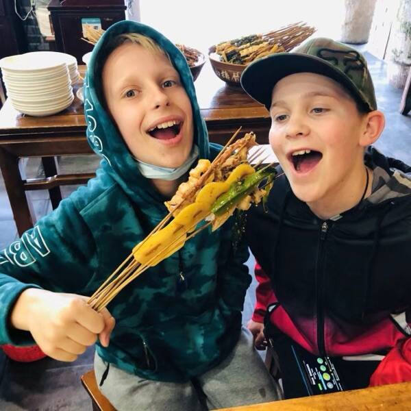 The boys counting their bo bo ji sticks