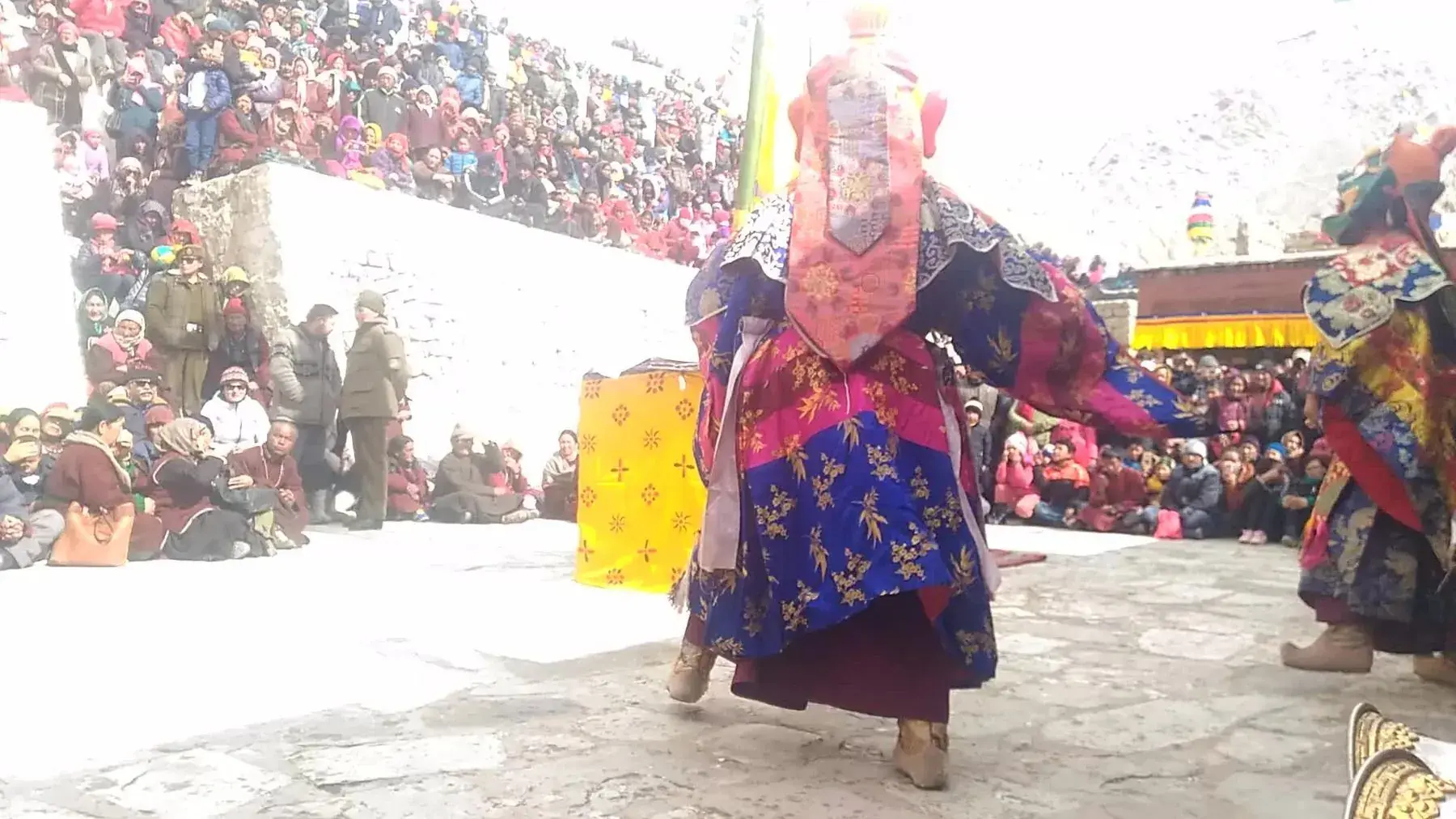 A masked dance before the whole village