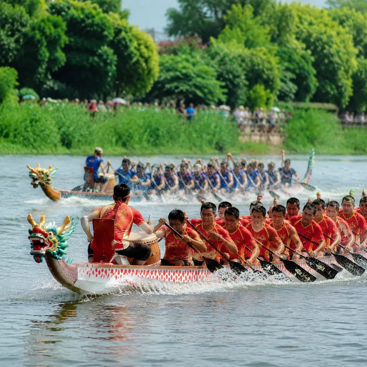 A dragon boat race on a river in southern China during the Dragon Boat Festival