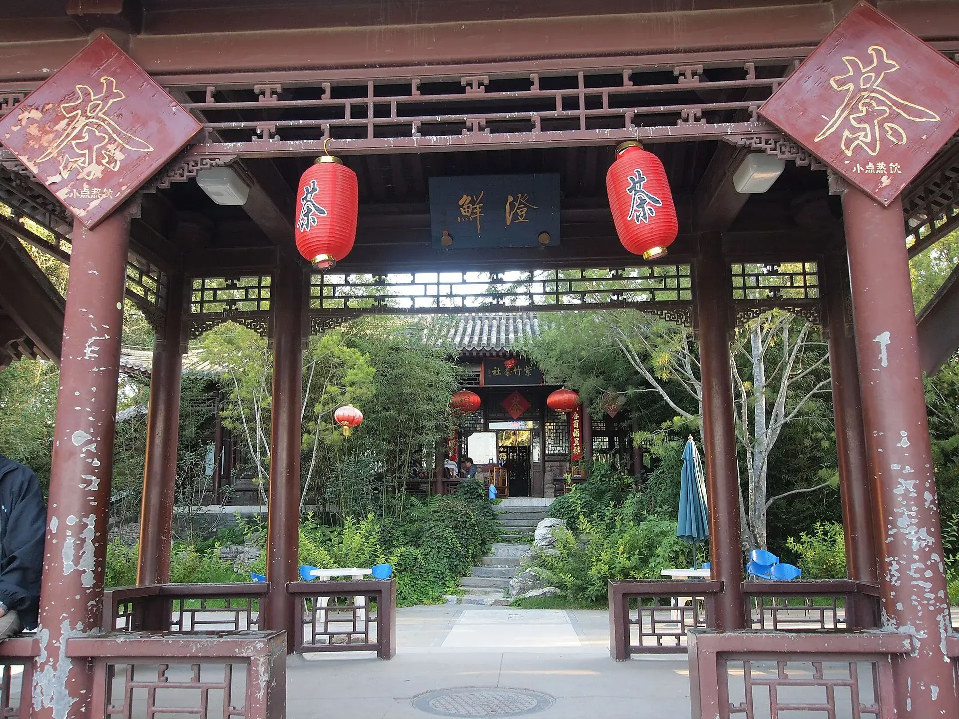 The gateway of a Beijing garden teahouse, hung with lanterns