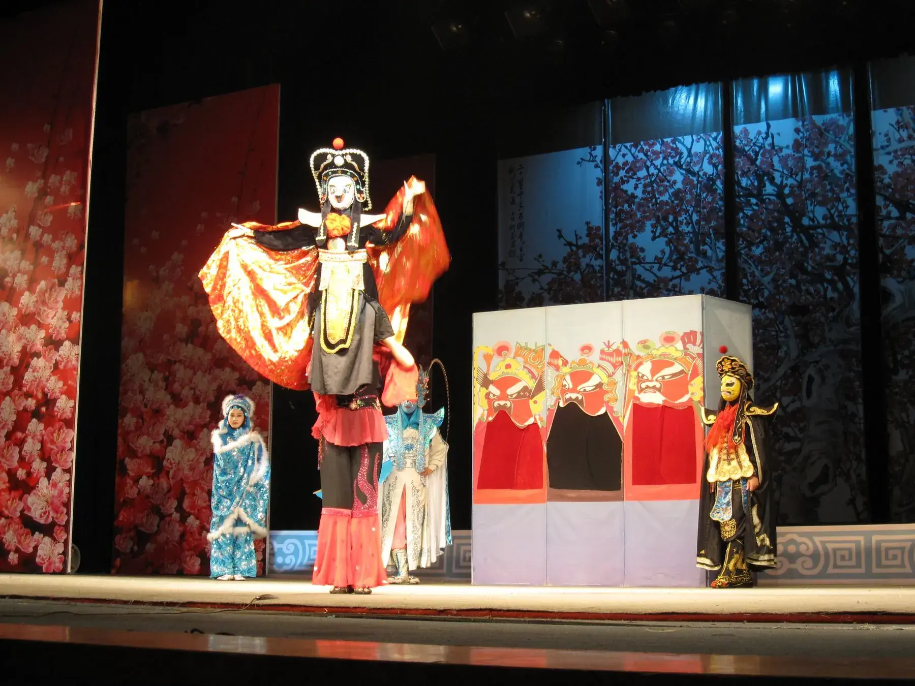 Sichuan opera performers on stage in full costume