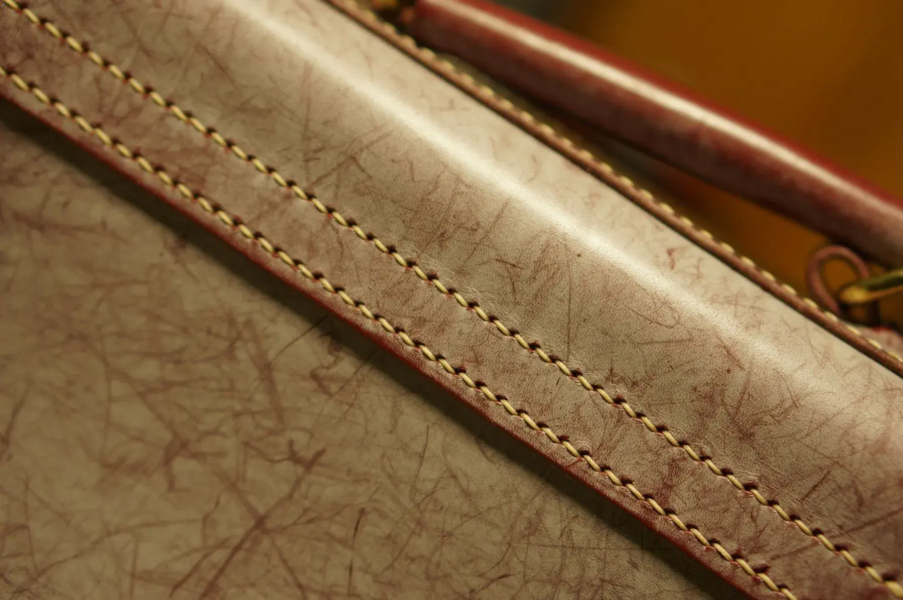 A hand-stitched leather seam