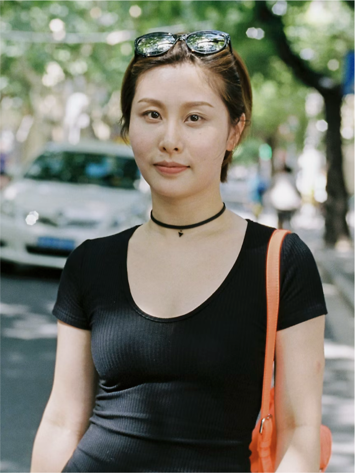 Mei Li — Senior Travel Designer